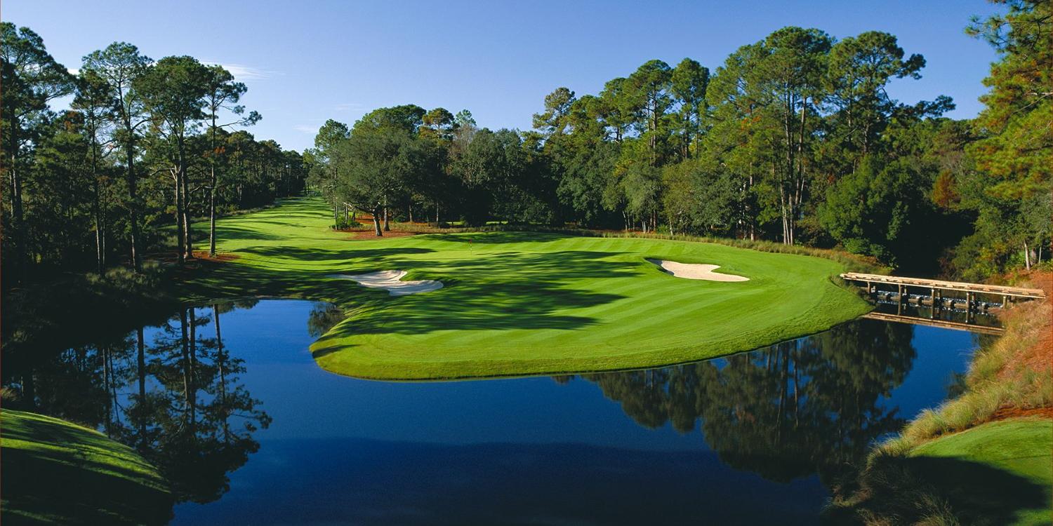 Wood bridge strategically placed to cross water hazard and navigate the course to the next hole