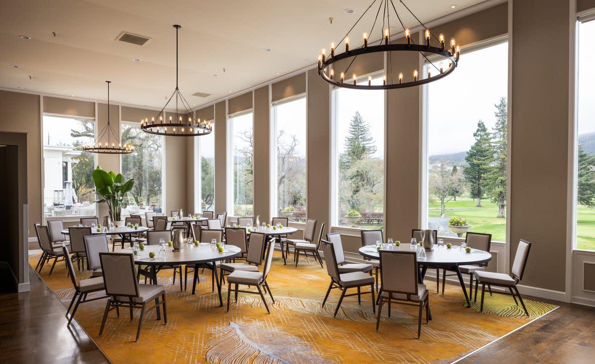 Indoor dining area at the resort with chandlers hanging from the ceiling