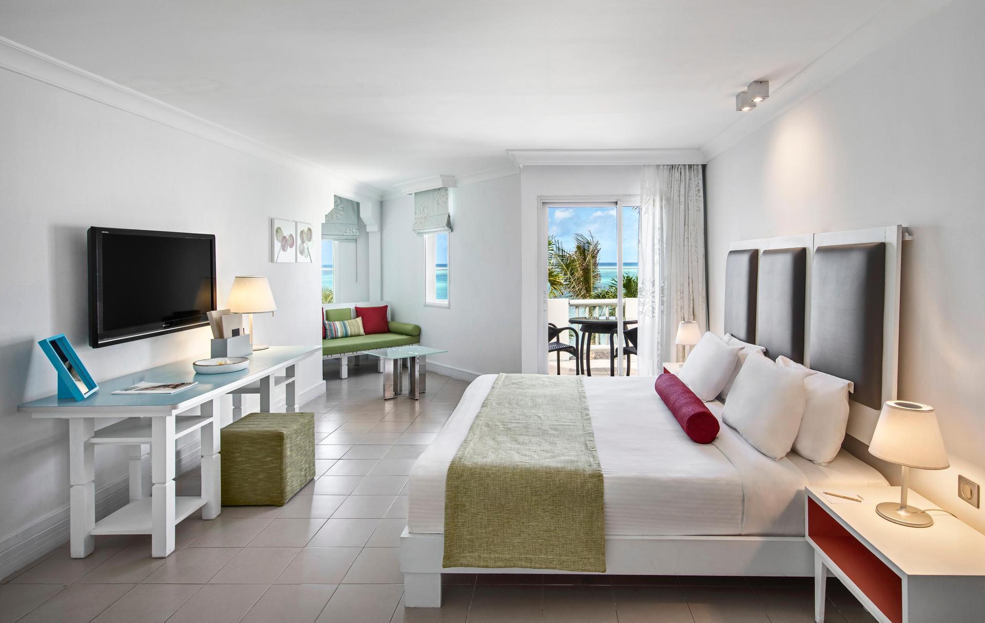 Double bed room at the resort with balcony views of the ocean