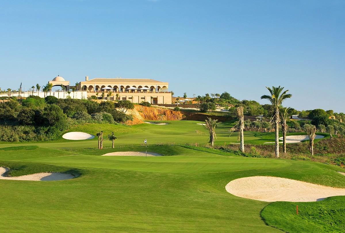 Undulating green with the clubhouse in the background