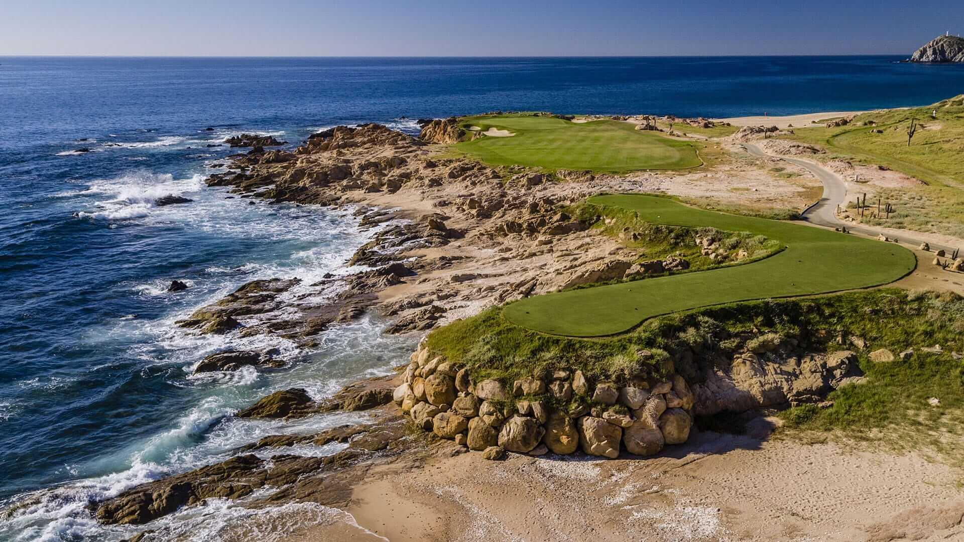 Panoramic view of the course with a sandy rough and coastal views