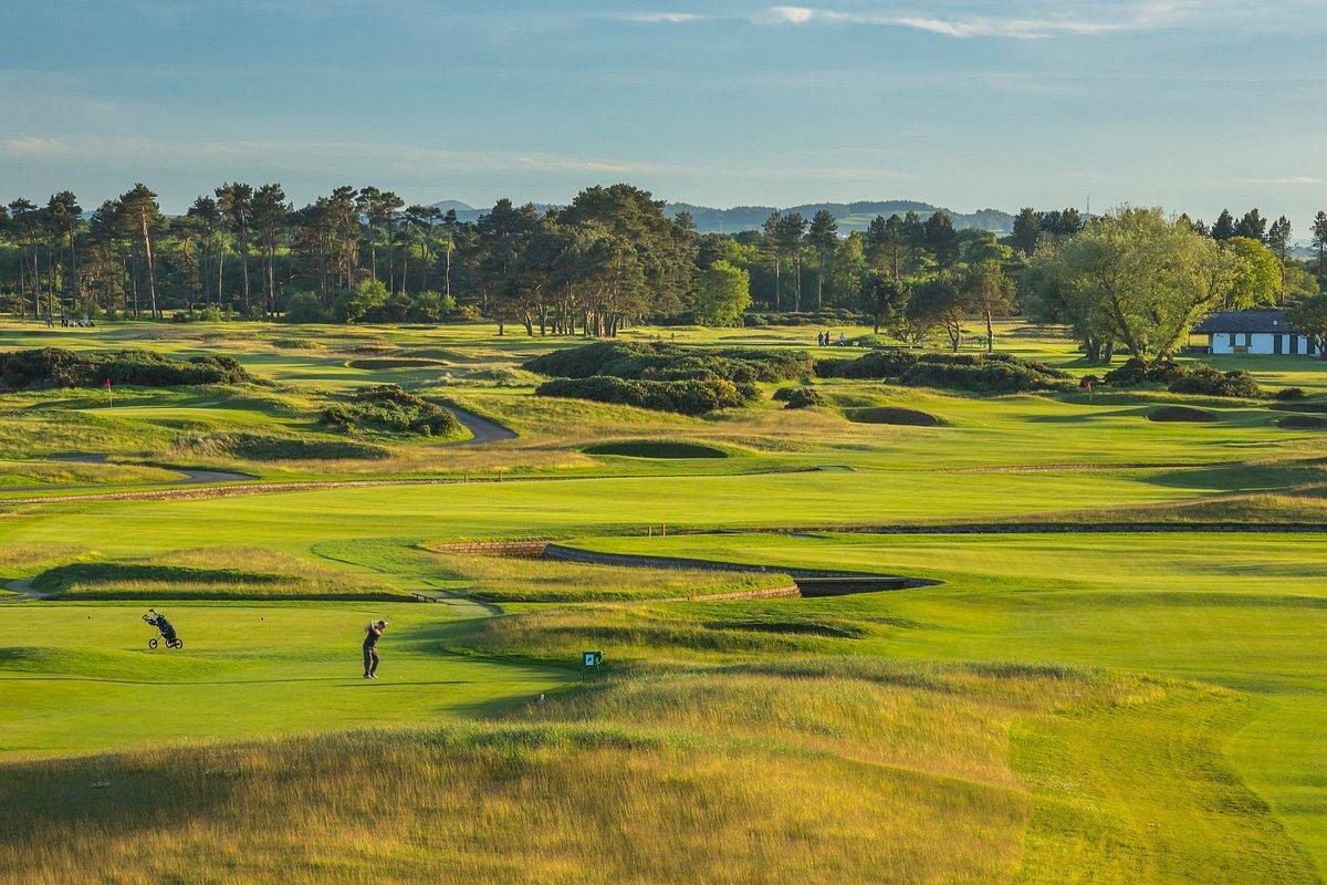 Panoramic view of golfers enjoying their round at the Carnousitie Golf Links course