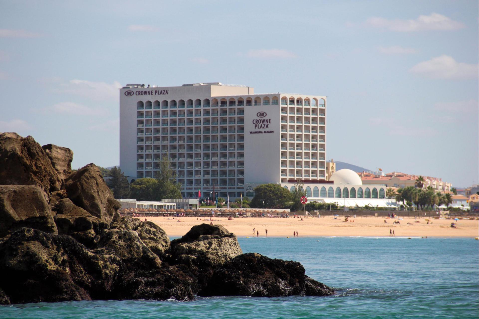 Outdoor view of the hotel with the beach visible