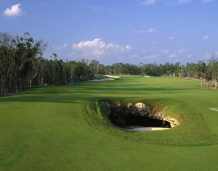 A deep natural sand bunker placed in the centre of a wide fairway