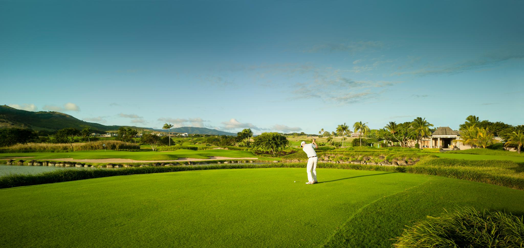 Golfer teeing off on the La Chateau Golf Course