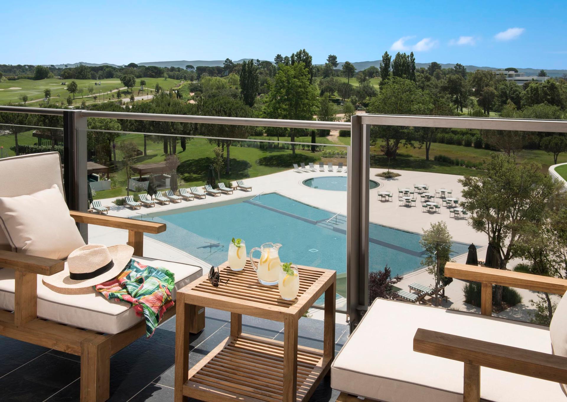 Balcony overlooking the swimming pool and golf course