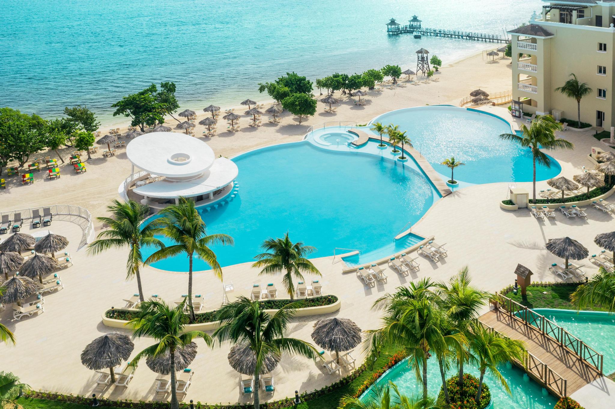 Birdseye view of the outdoor swimming pool at the Iberostar Selection Rose Hall Suites hotel