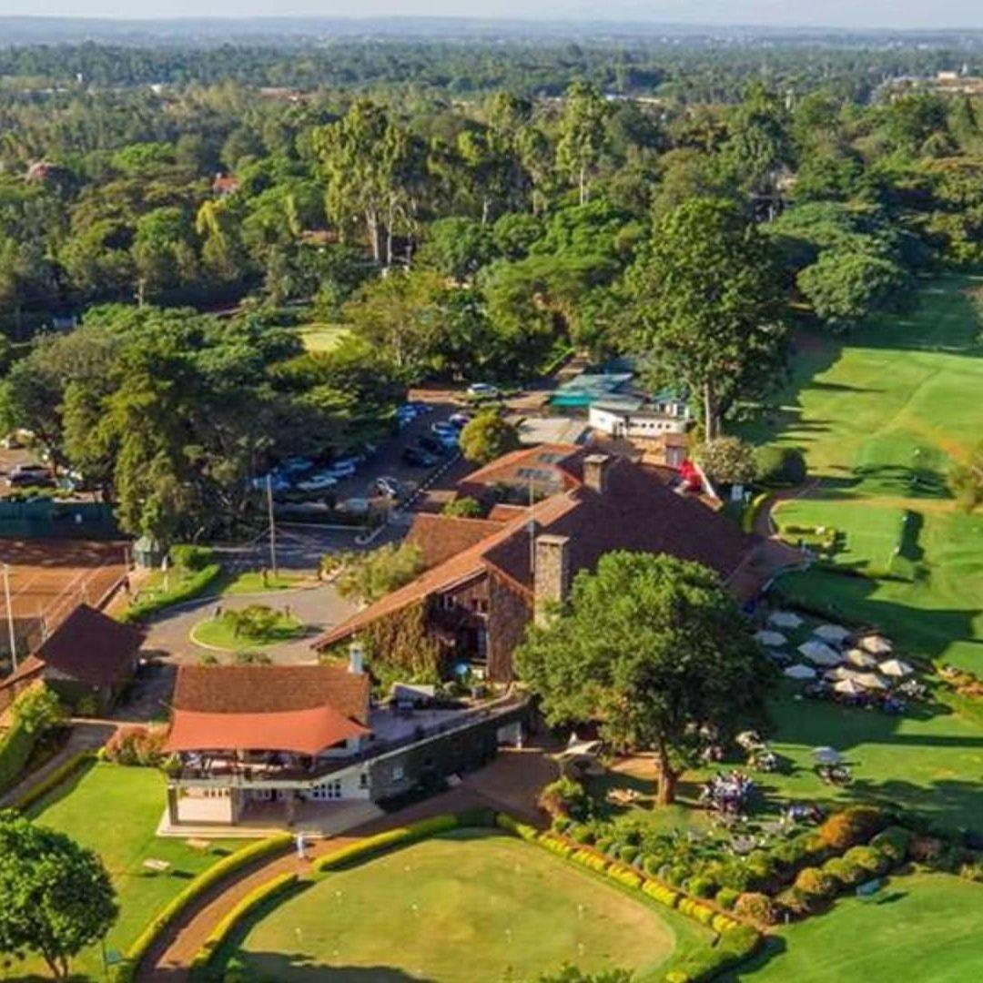 Aerial shot showcasing the clubhouse and course layout of Karen Golf & Country Club.