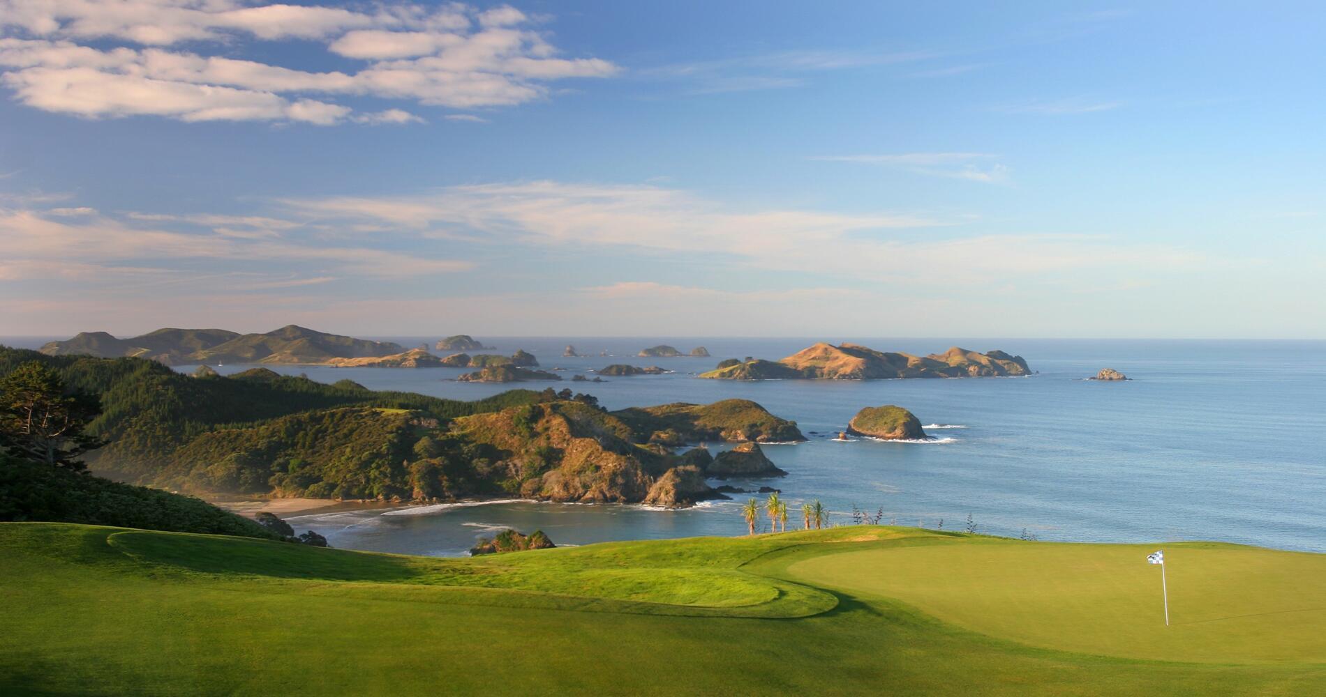 A smooth green with coastal views at the Kauri Cliffs Resort golf course