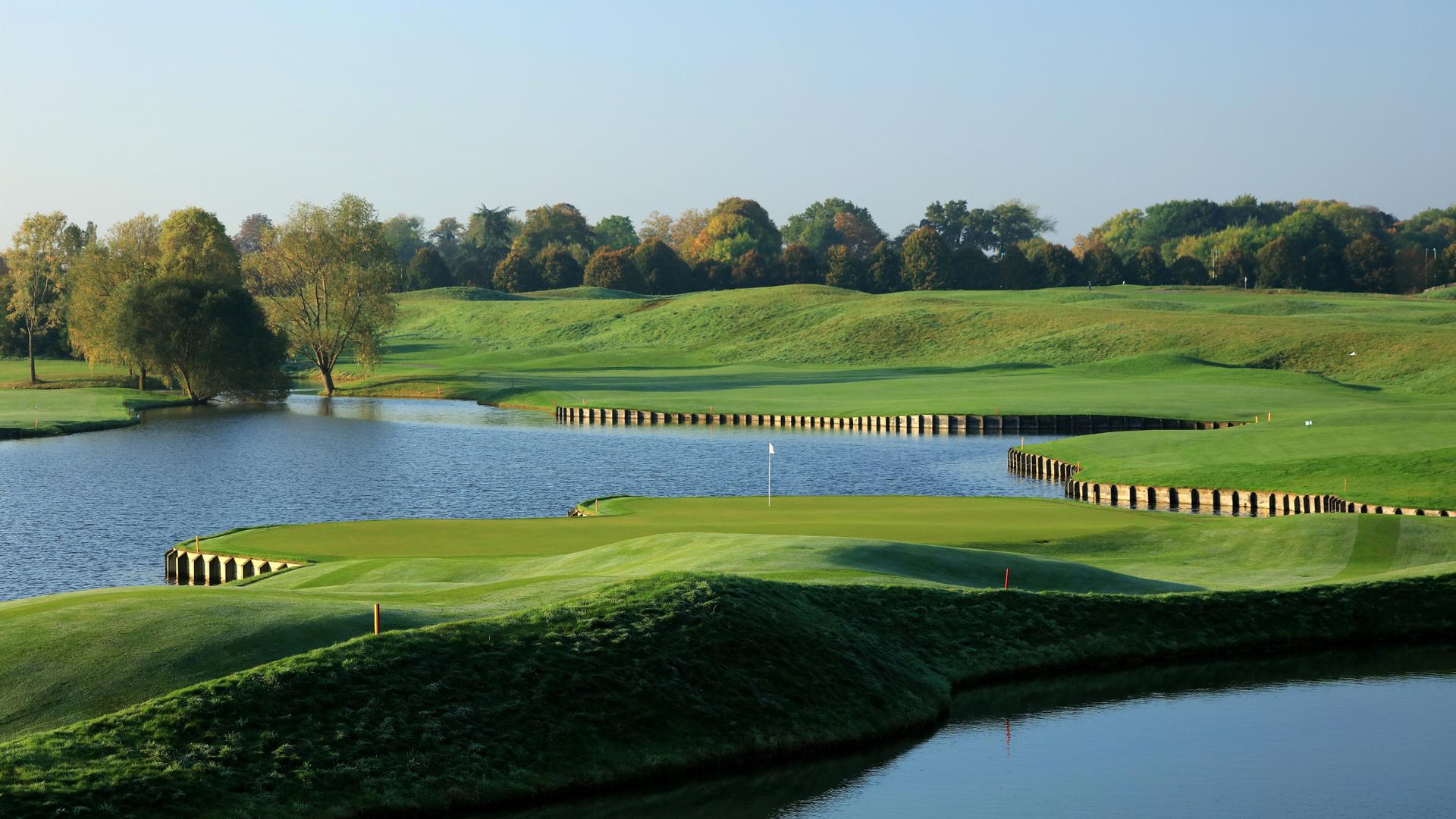 Undulating green surrounded by water