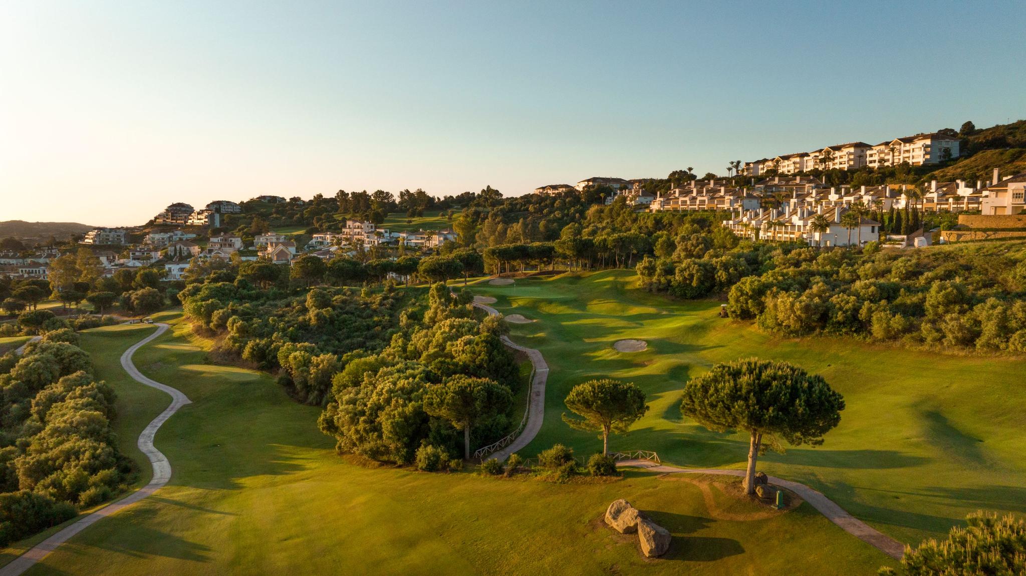 View of undulating fairways with the hotel in the background