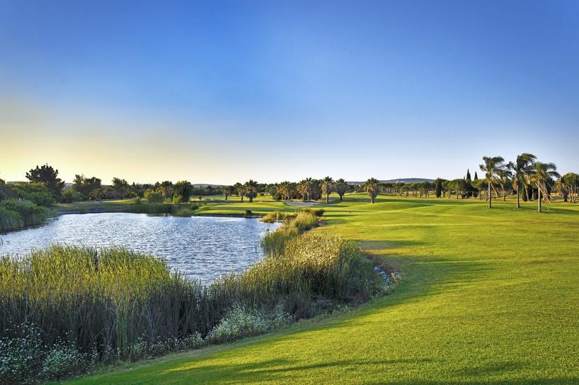 Fairway with a water hazard up the left