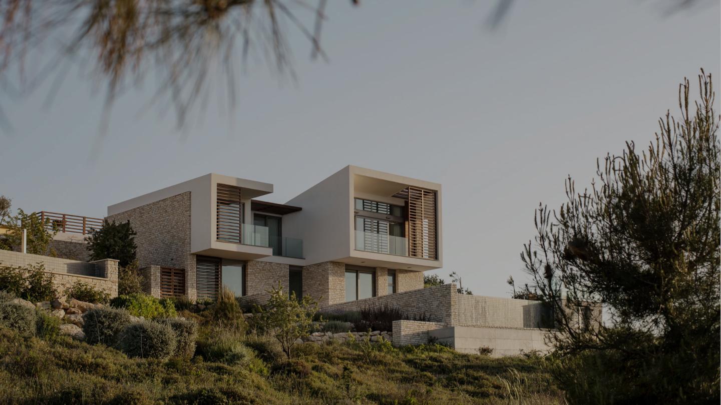 Panoramic exterior view of a modern villa at the hotel