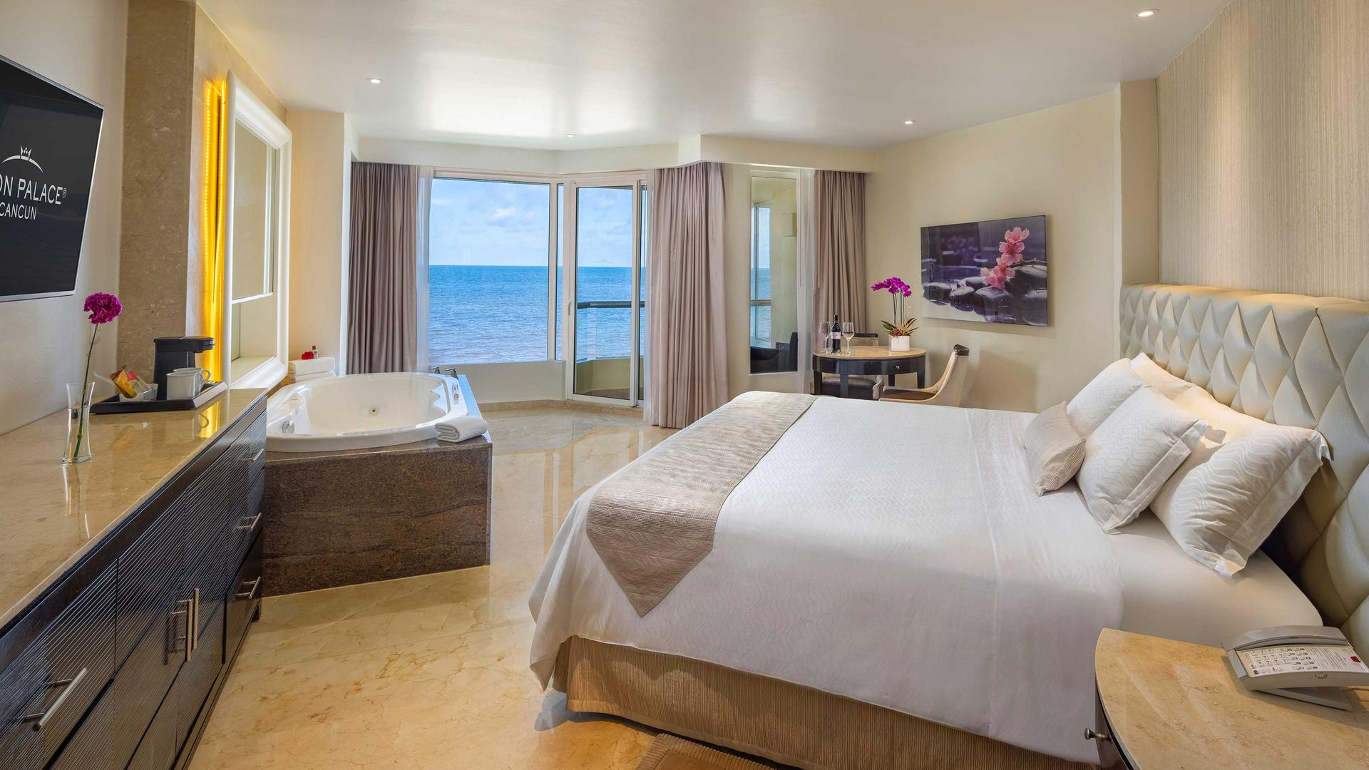 Double bed room at the Moon Palace Resort with balcony views of the ocean