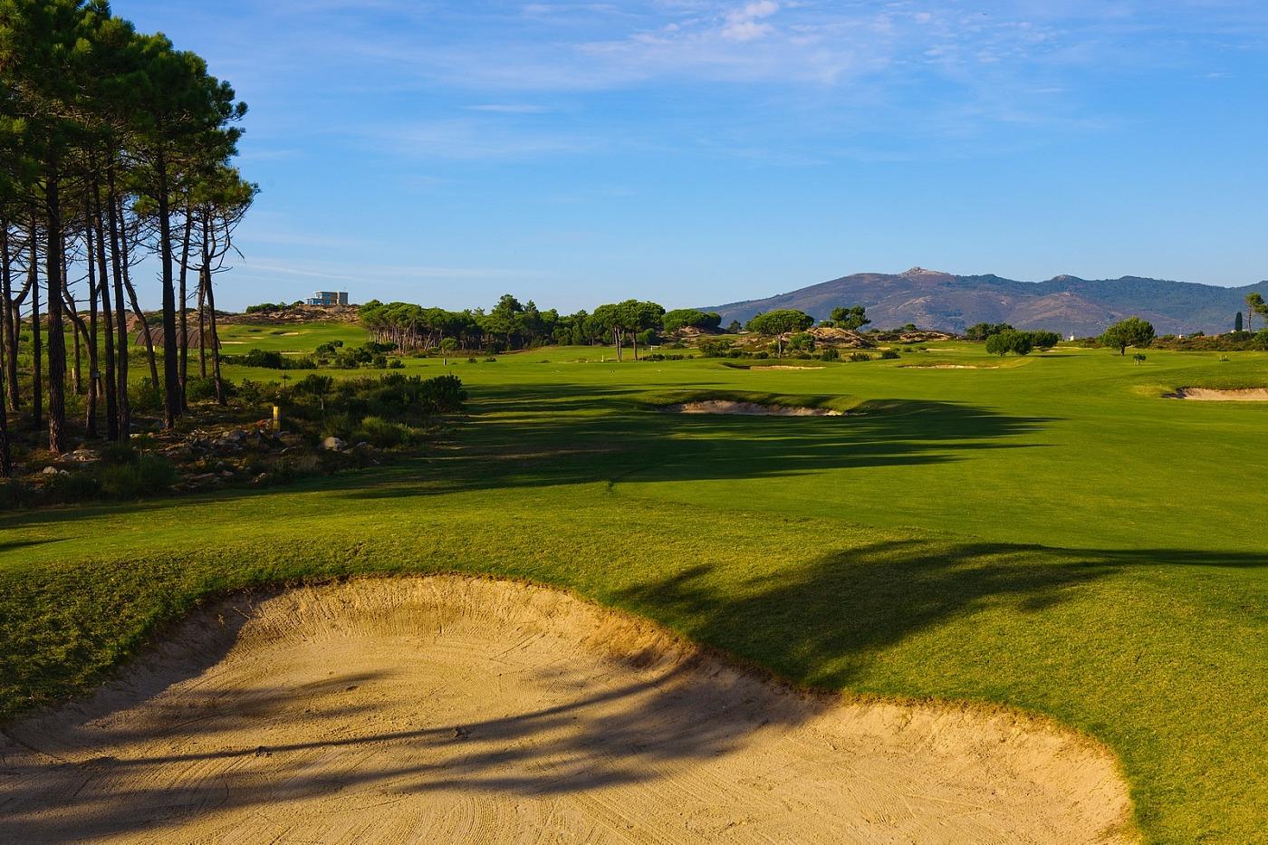 View of the course with mountains in the background