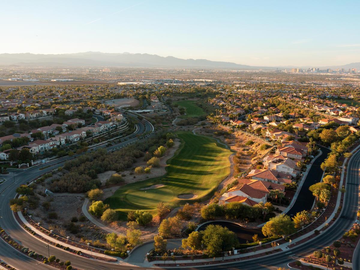 A scenic aerial view of Serket Golf Club nestled among vibrant residential communities.