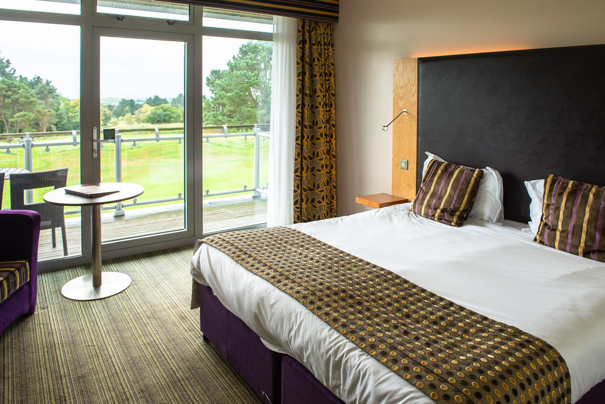Double bed suite with patio views of the course