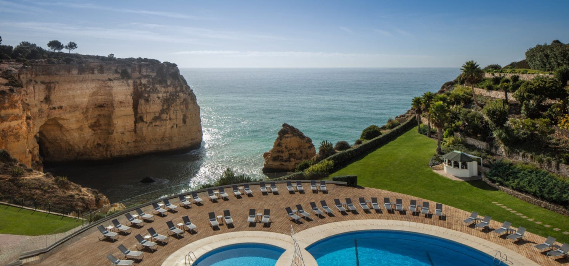 Outdoor swimming pool area overlooking the ocean