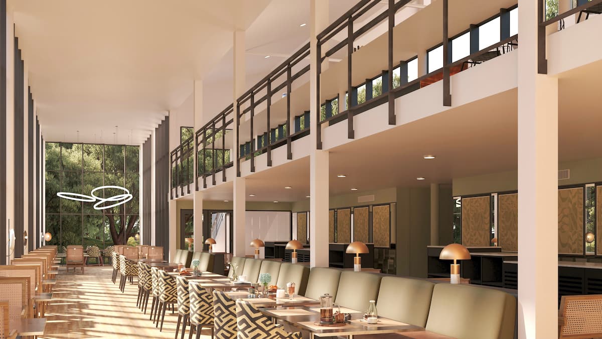 A modern dining room with panoramic windows for natural light