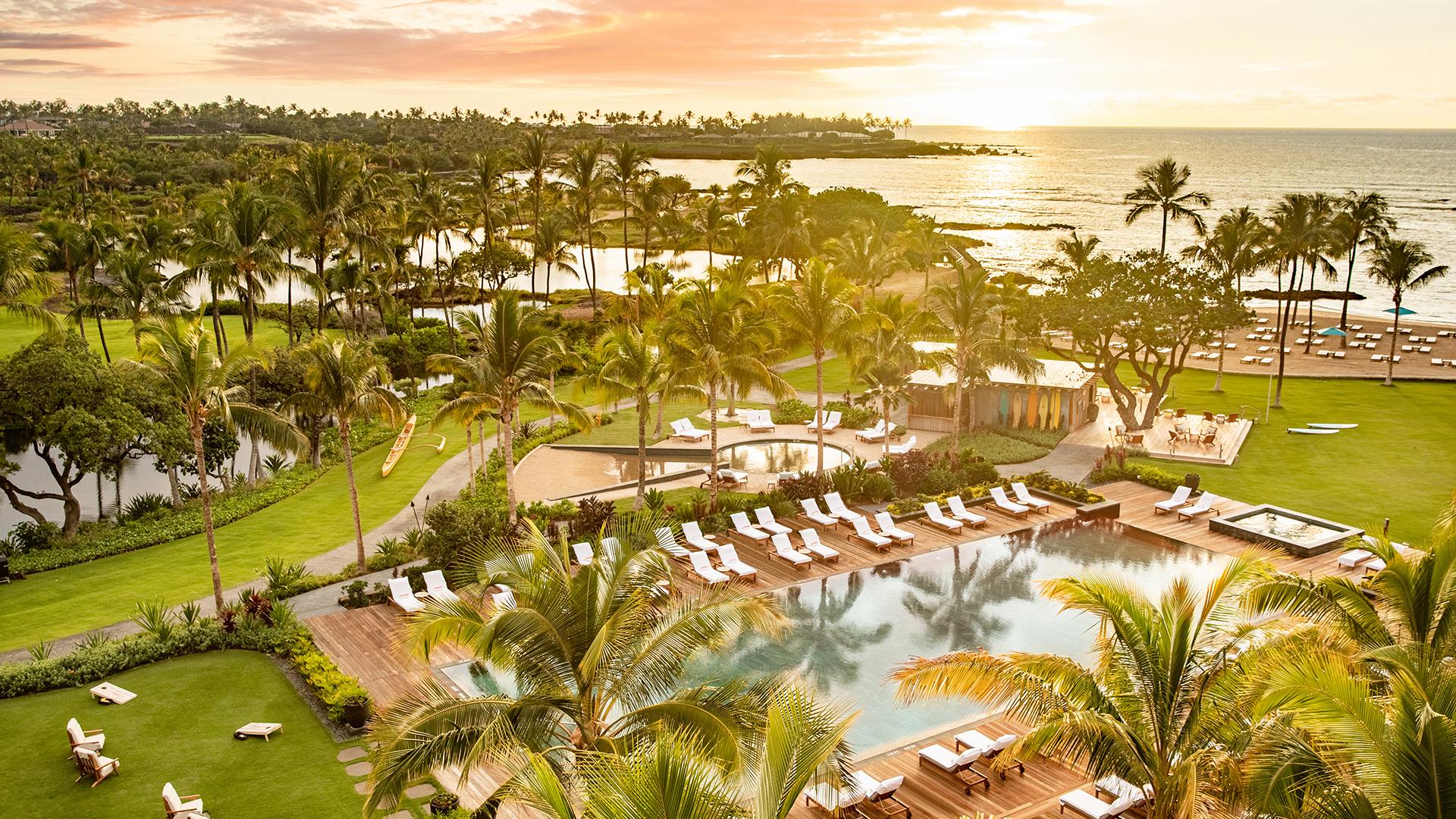 Aerial view of the outdoor pool area at sunset