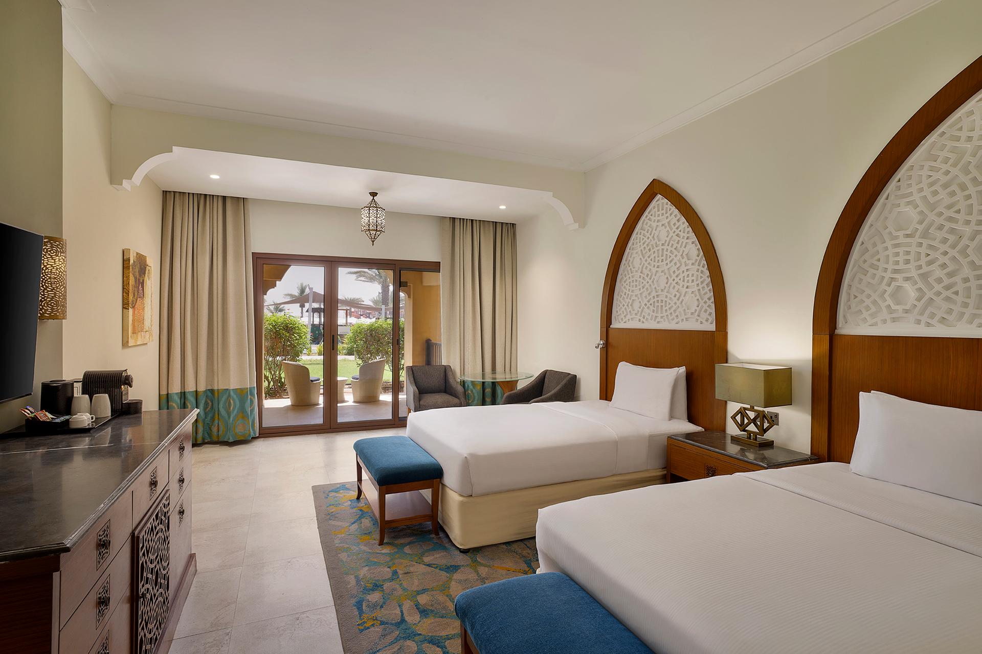 Twin room with outdoor patio area