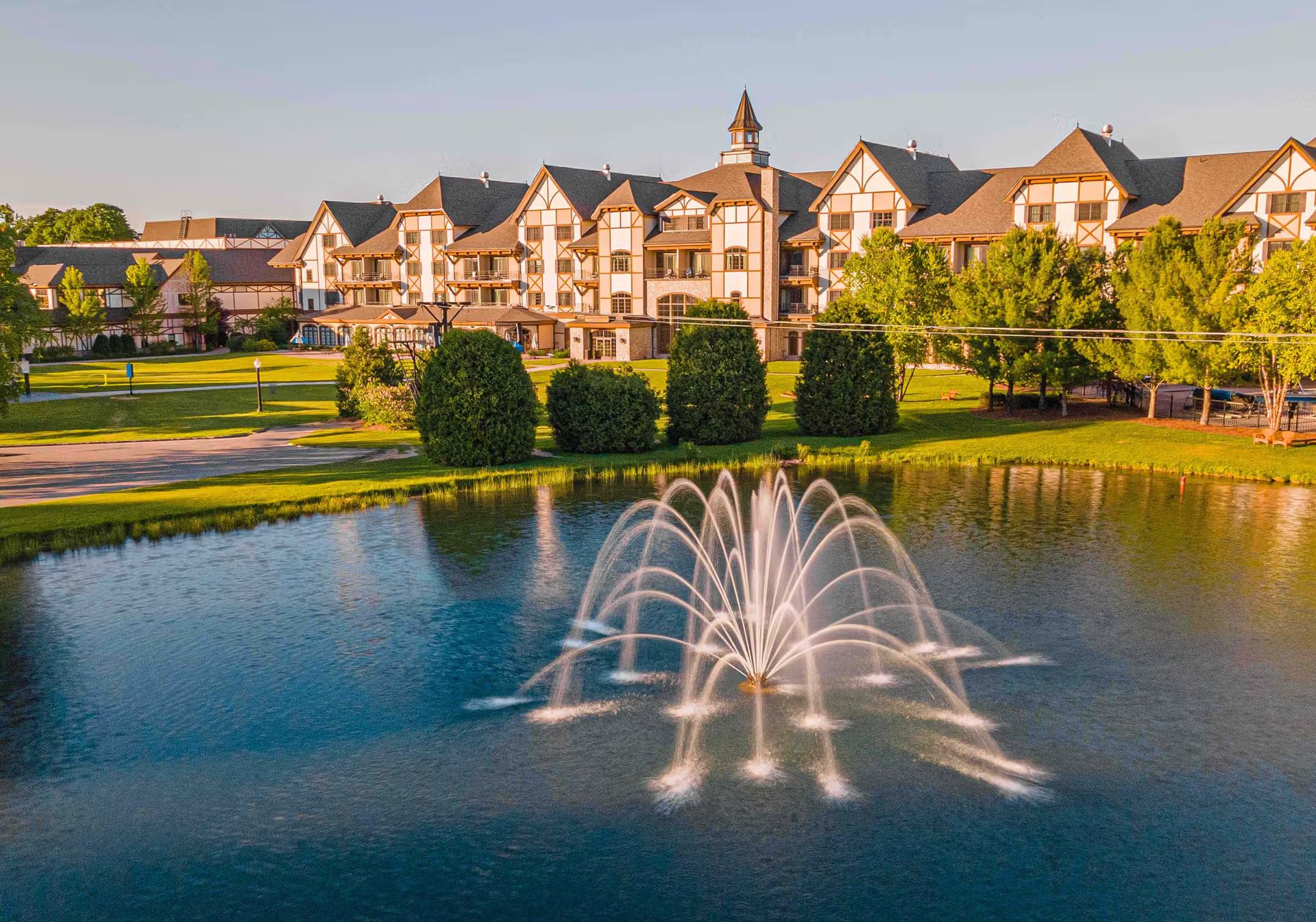 Exterior view of the resort with a water fountain at the front