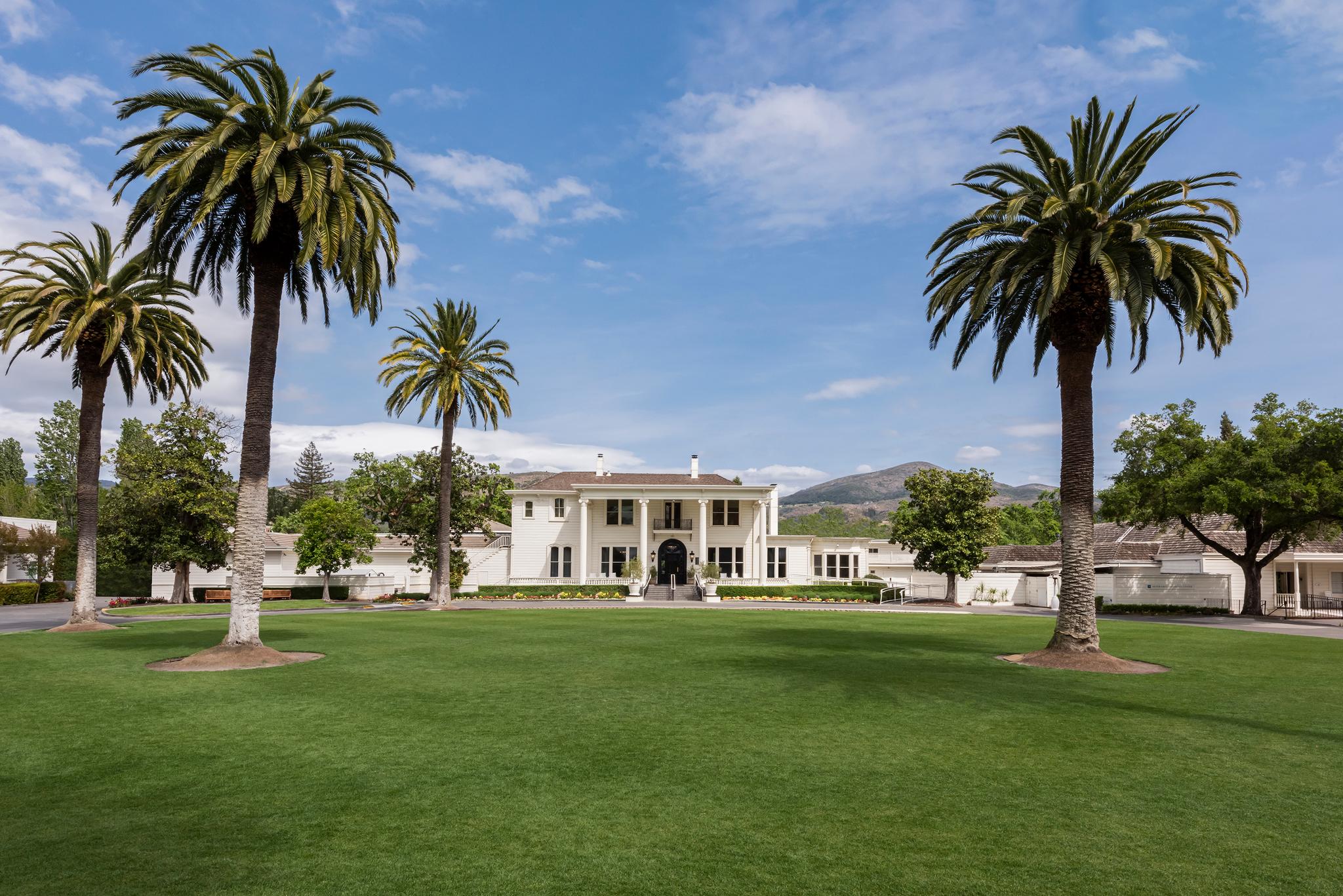 Panoramic view of the Silverado Resort with palm trees in the front garden