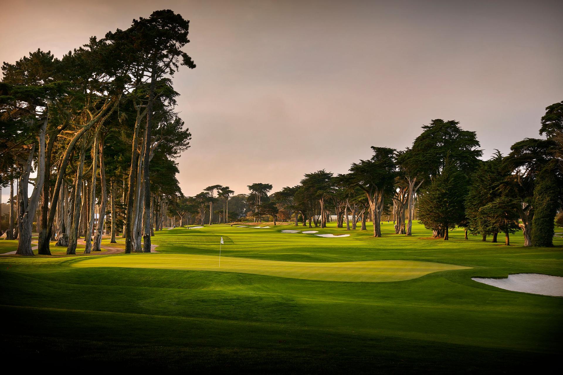 A fairway leading to a smooth green