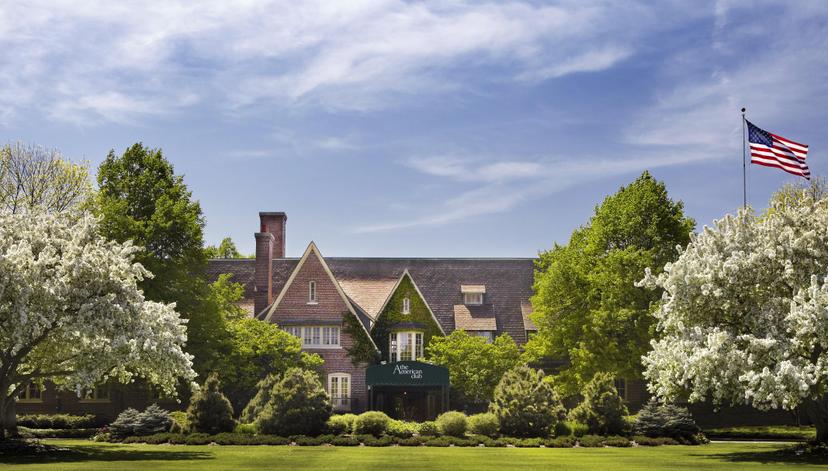 Panoramic view of The American Club with a American flag