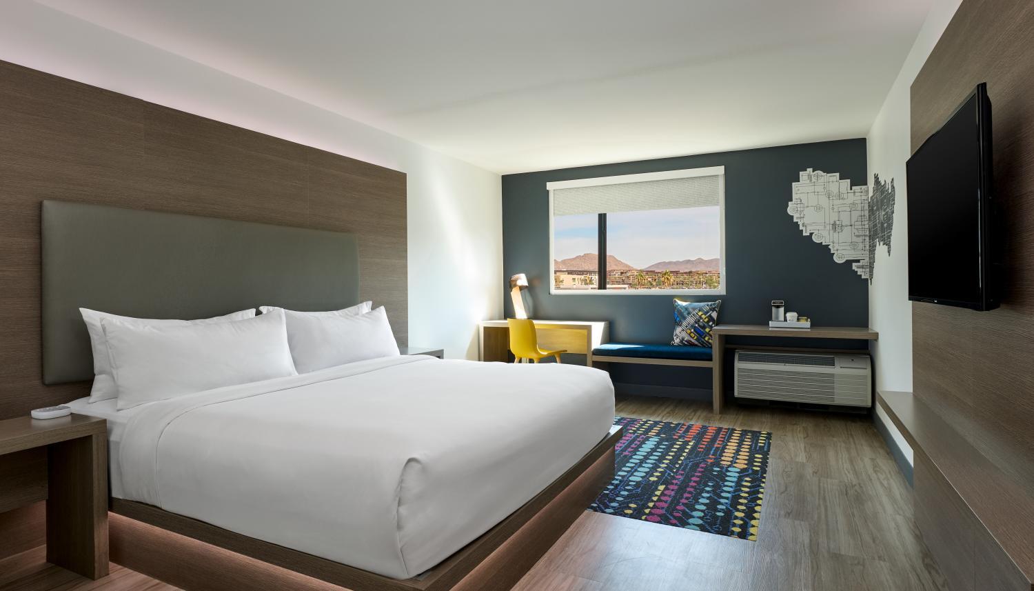 A modern double bed room with a window