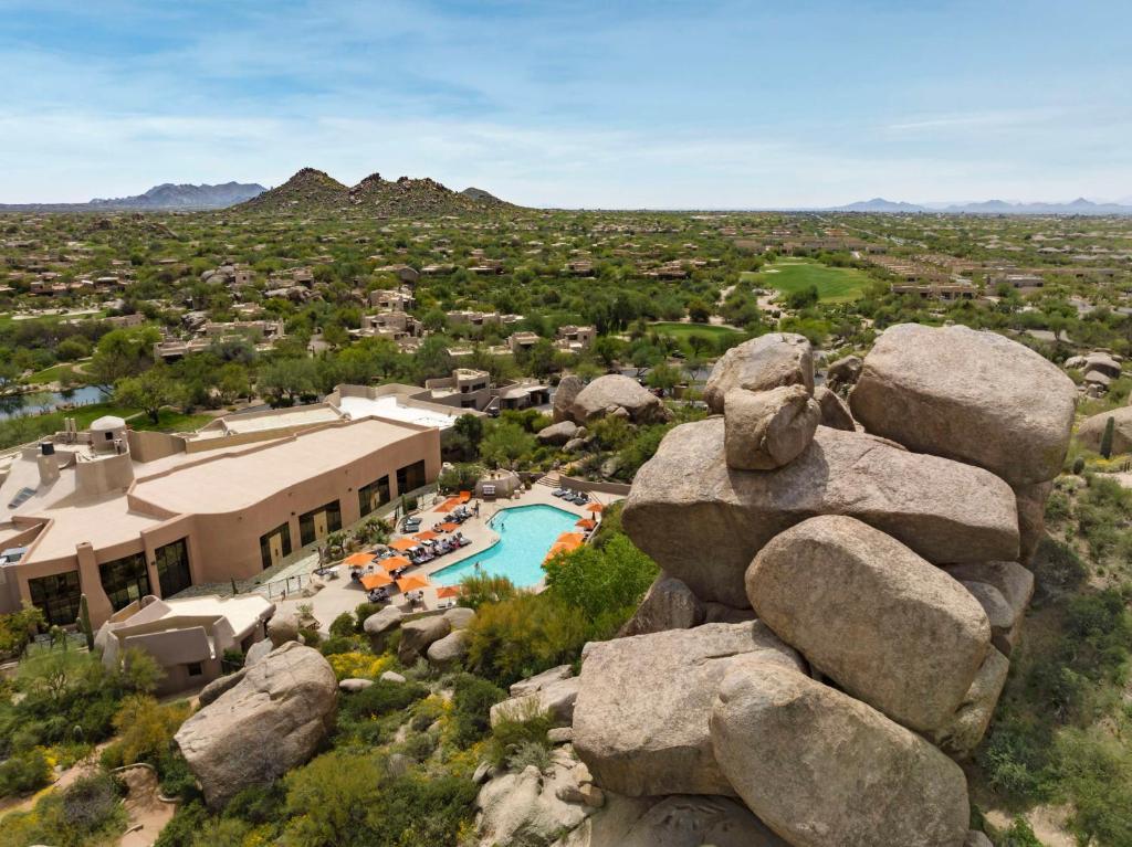 Aerial view of rocks towering over the Boulders Resort & Spa swimming pool