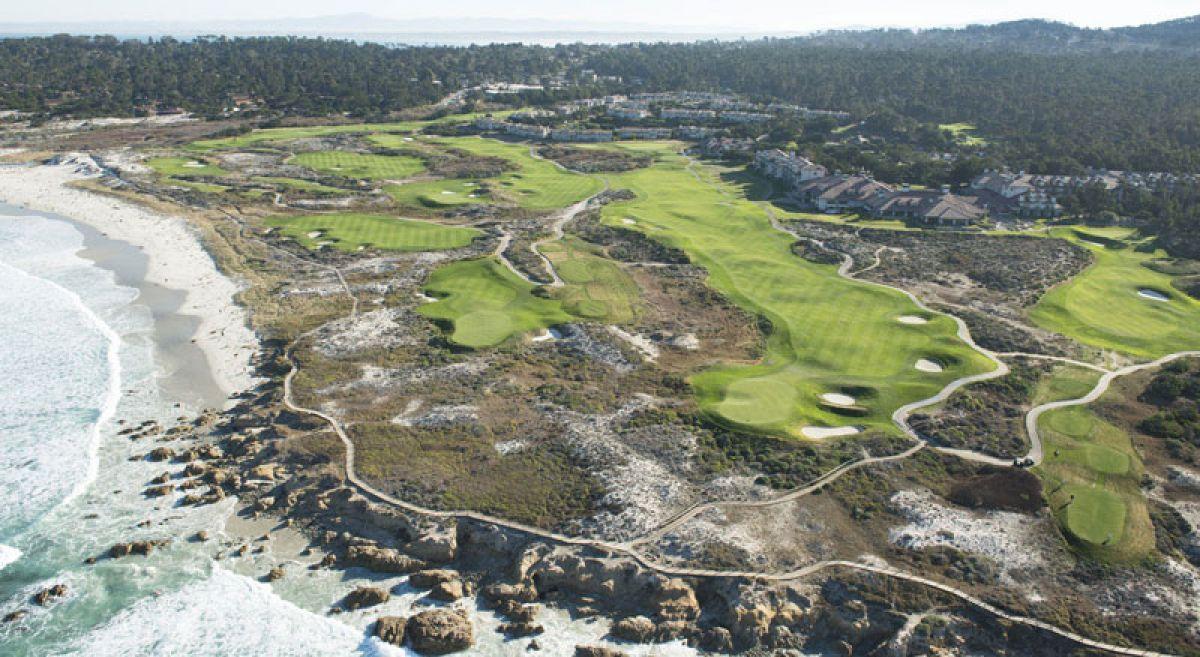 Birdseye view of the course showing its winding fairways and rocky rough with coastal views