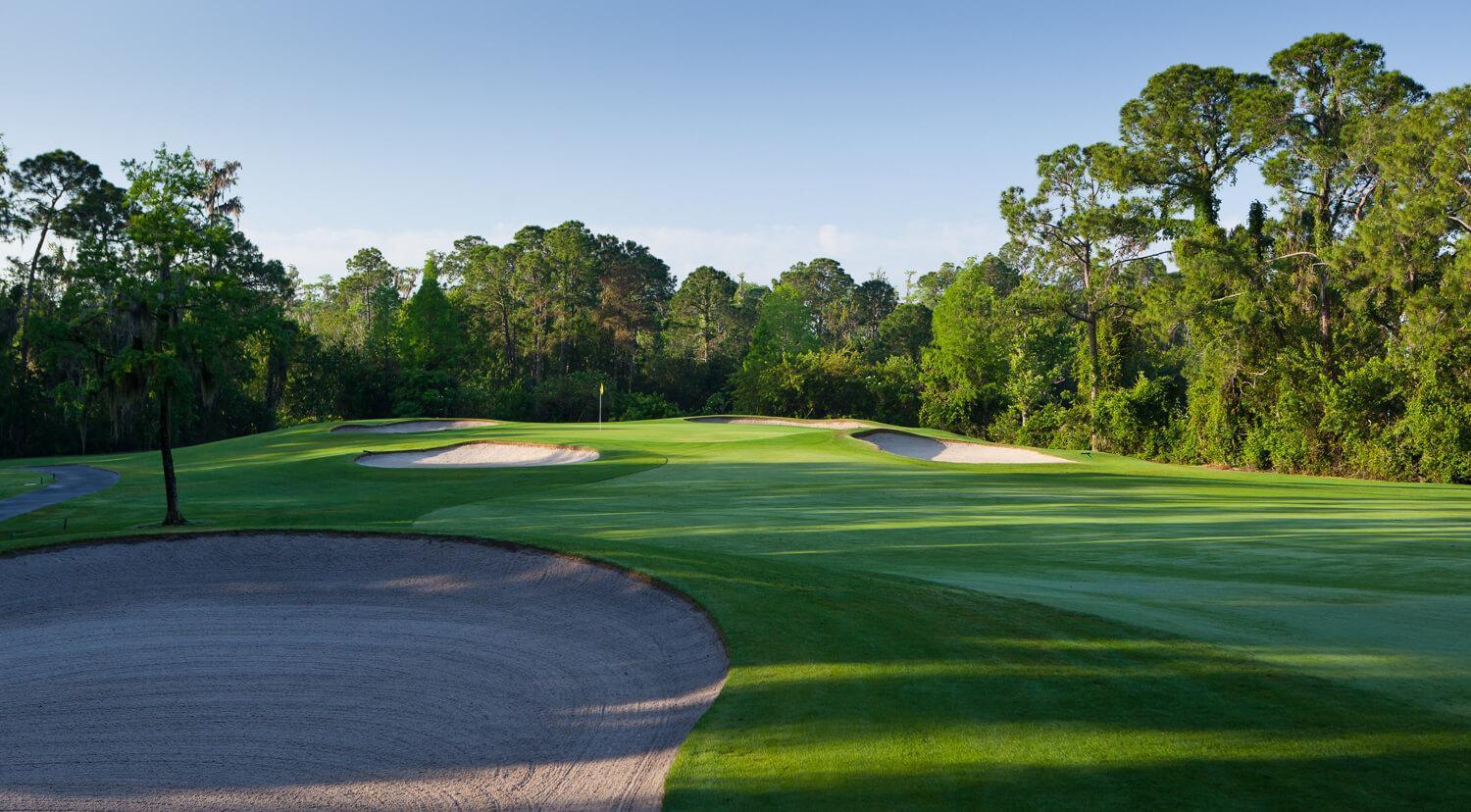 Sand bunkers littered around the green at Disney Lake's Buena Vista Golf Course