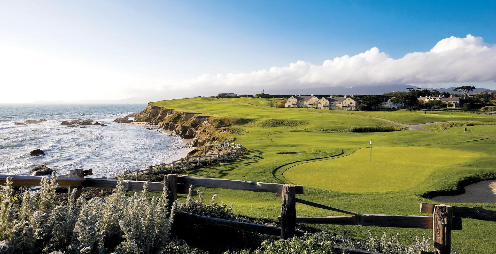 A manicured fairway running down the coast