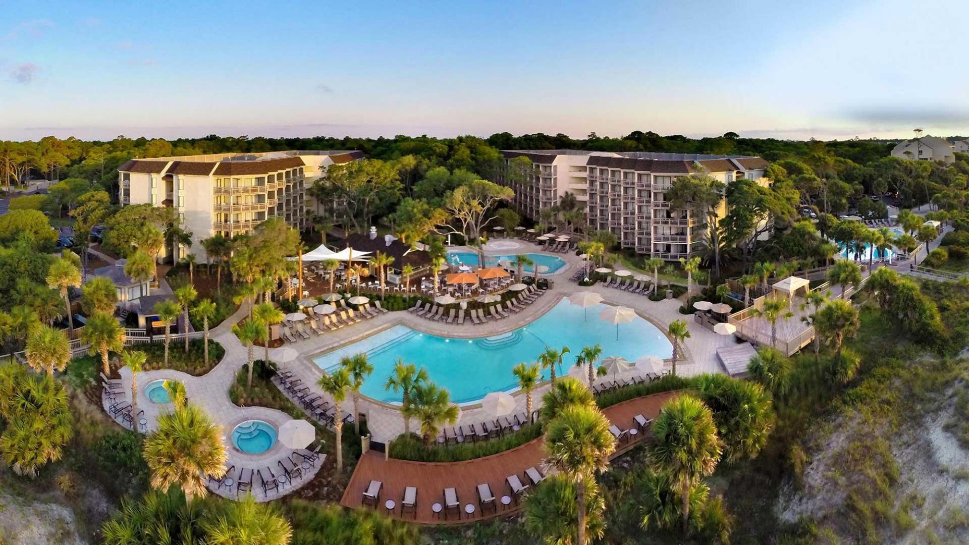 Birdseye view of the outdoor swimming pools and jacuzzi's at the Omni Hilton Head Oceanfront Resort