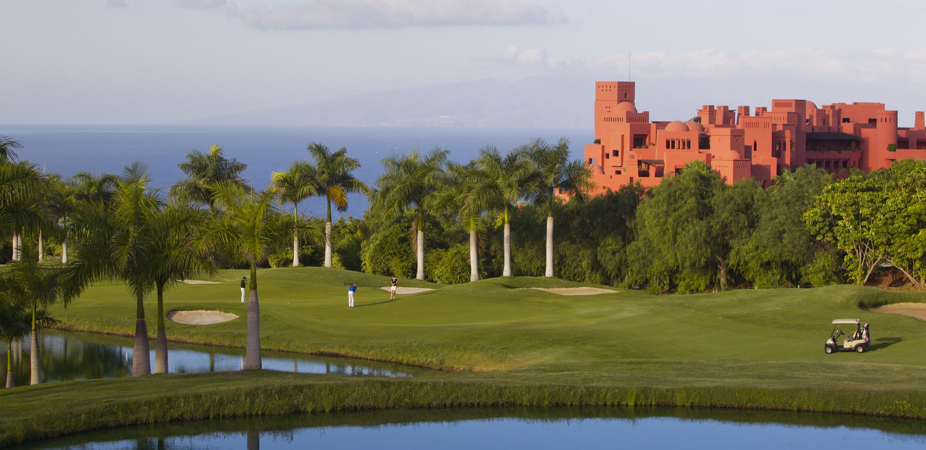Undulating fairway wit a water hazard on one side and the Ritz-Carlton Tenerife, Abama on the other