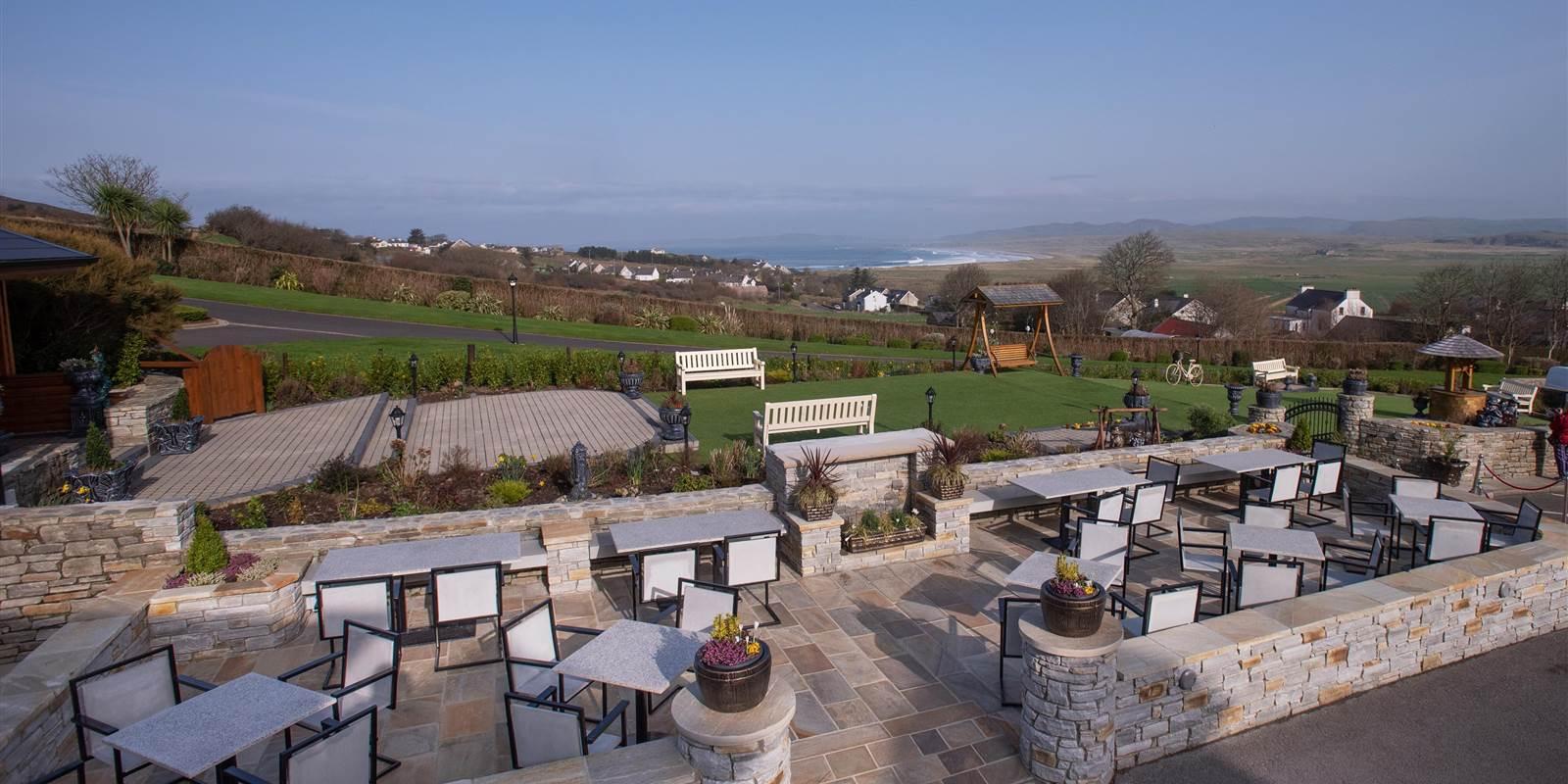 Outdoor seating at the lodge overlooking the greens if you want to enjoy a meal outside or just watch and your co-haul tee off