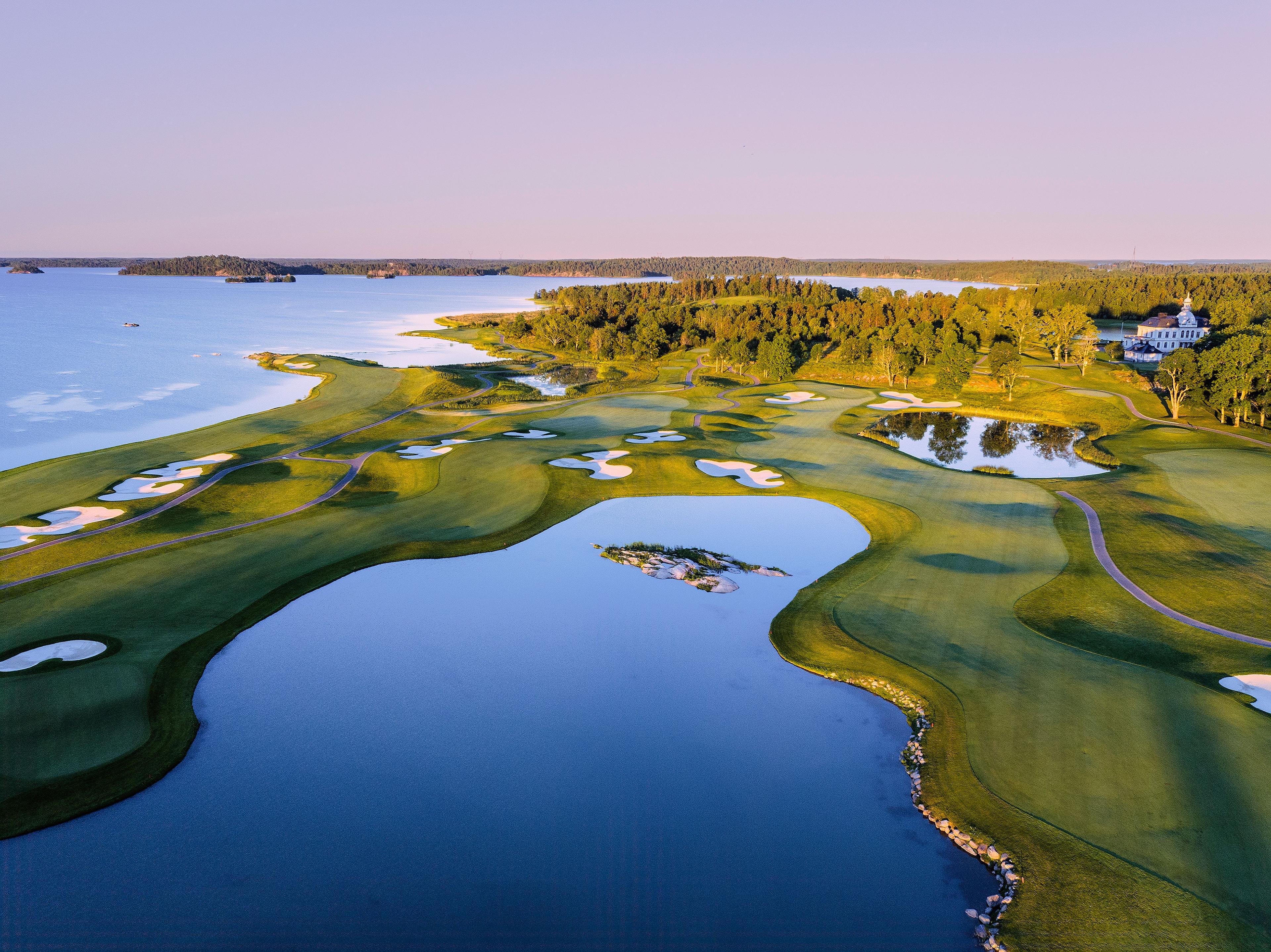 Birdseye view of The Stadium Course surrounded by water with coastal views