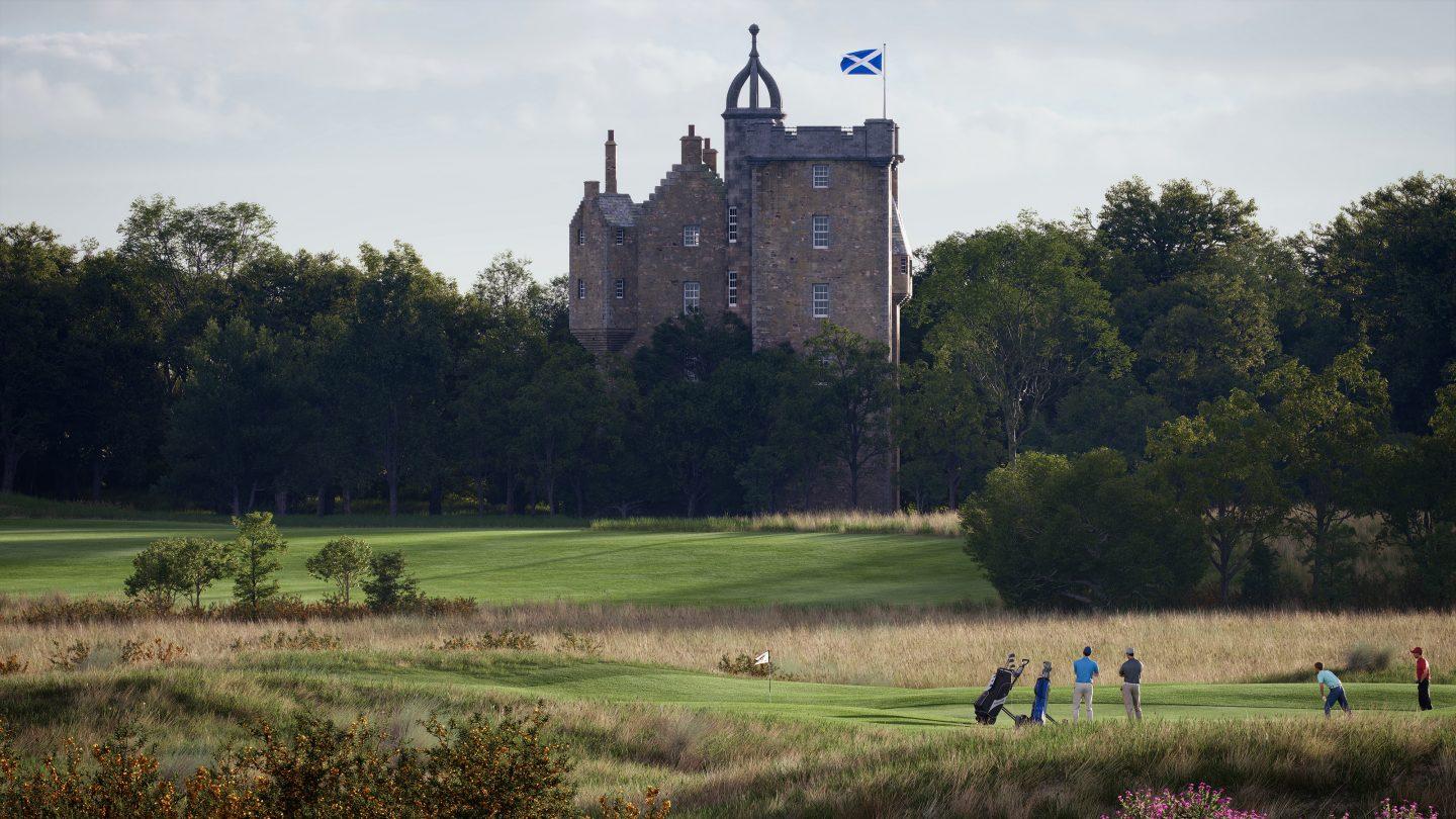 Castle like structure flagging the Scottish flag overlooking golfers enjoying their round