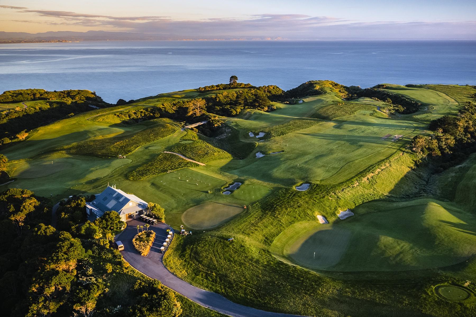 Birdseye view of wide fairways and smooth greens nestled with sand bunkers