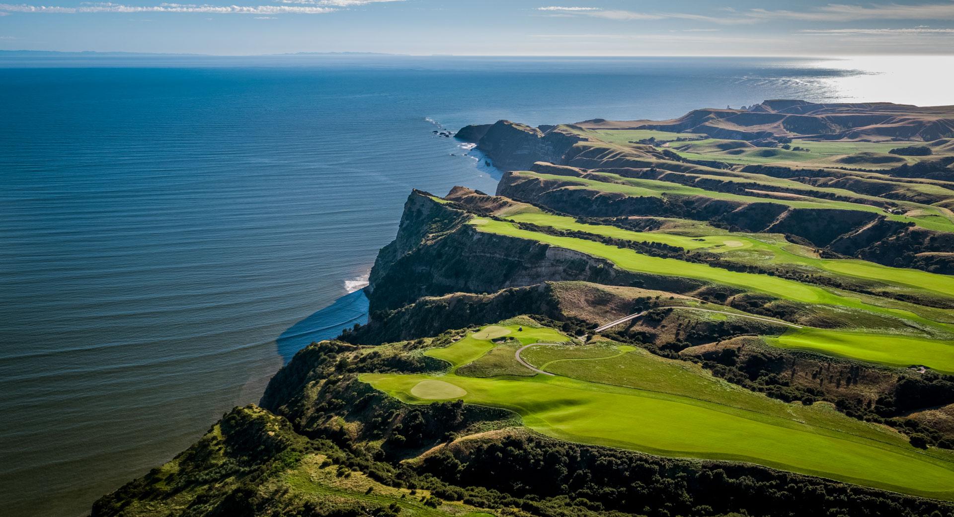 Overhead view of wide well maintained fairways with coastal views at the Cape Kidnappers Resort