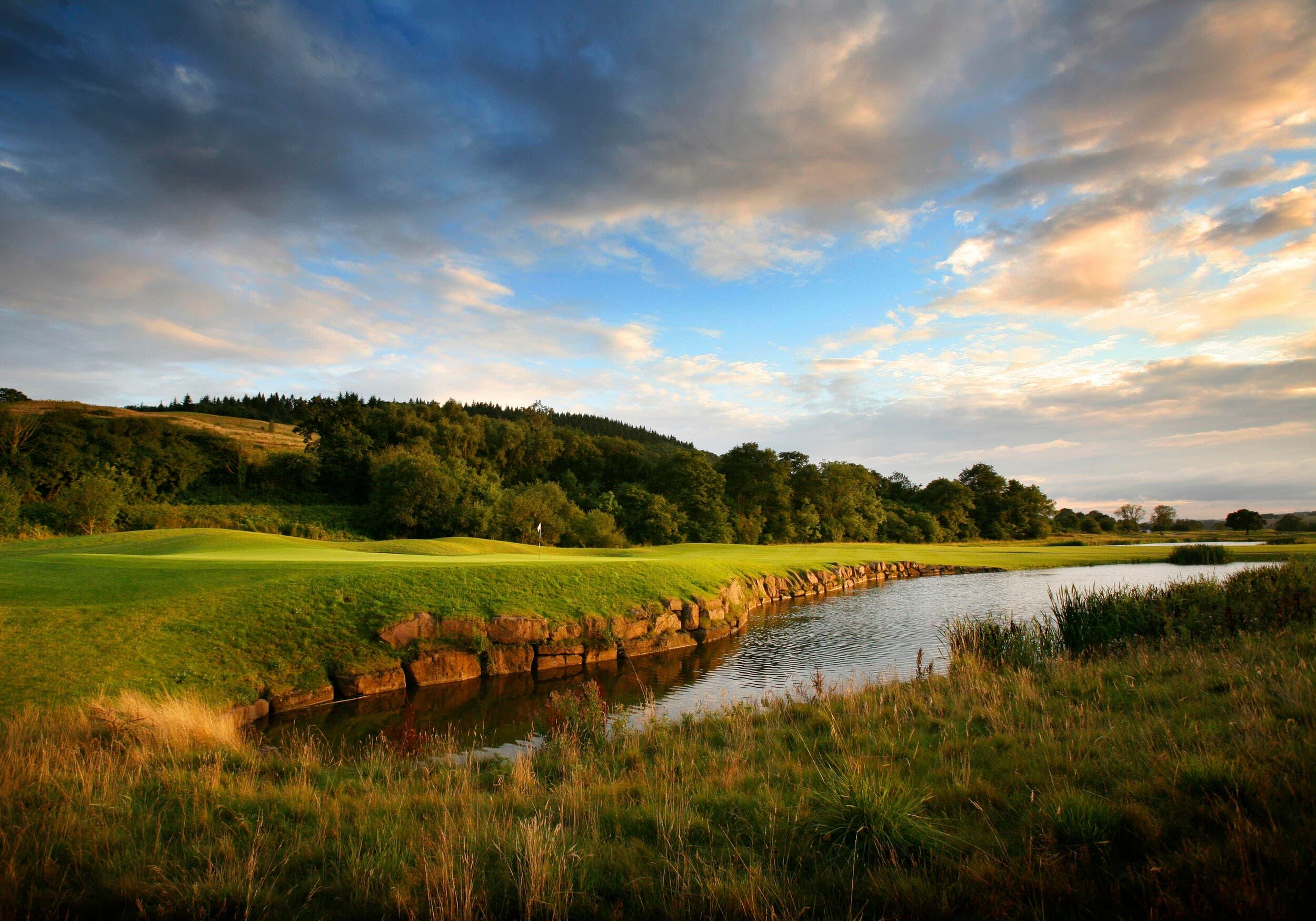Celtic Manor golf course with lush greens and water feature
