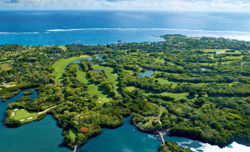 Birdseye view of the Constance Belle Mare Plage golf course and coastal views