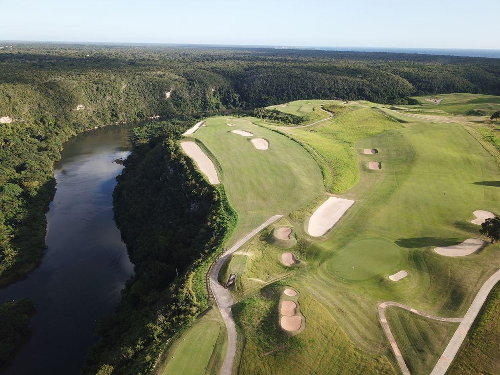 Aerial view of the Dye Fore course nestled with sand bunkers next to a water filled trench
