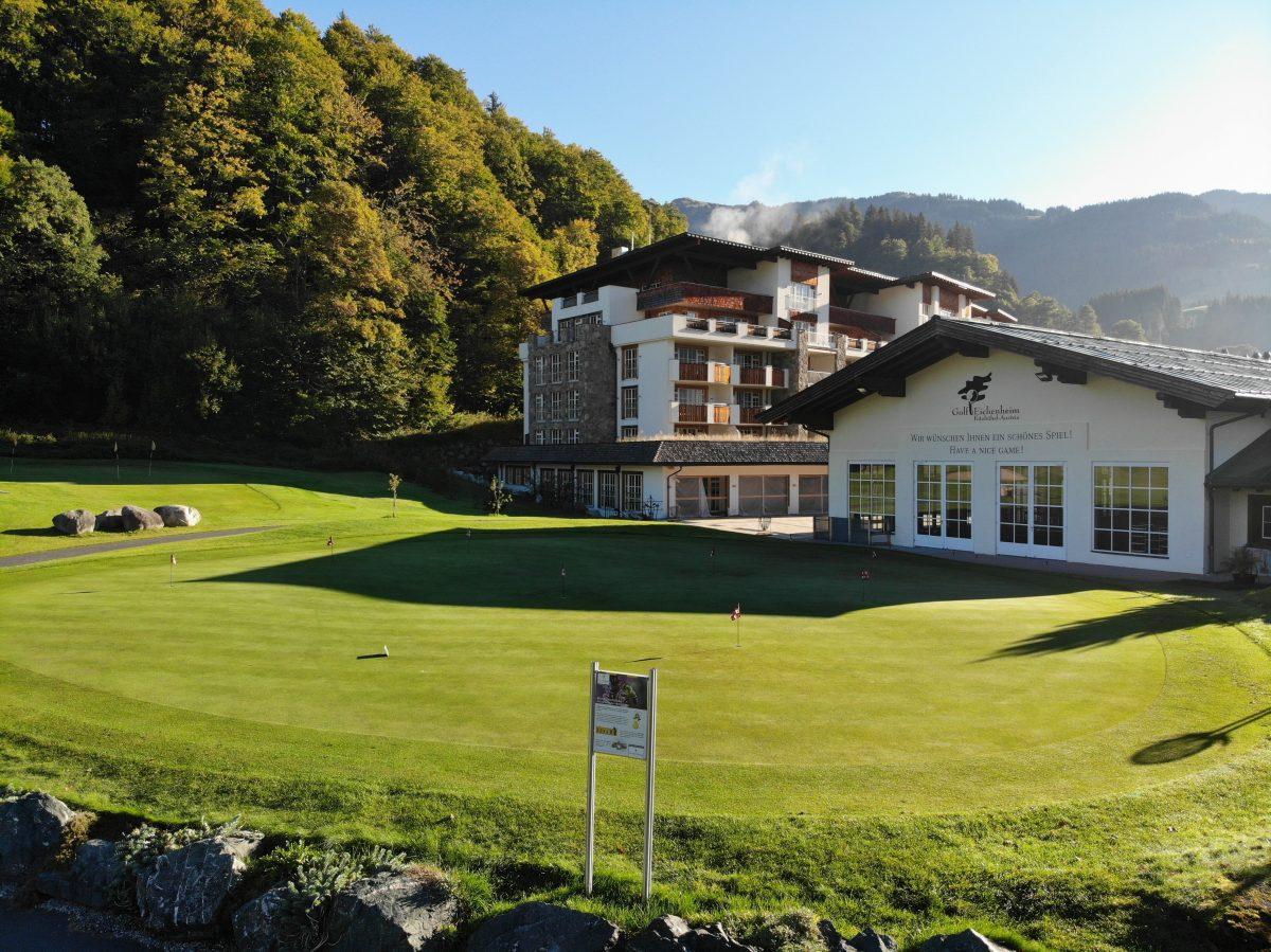 The Eichenheim clubhouse overlooking a practice green