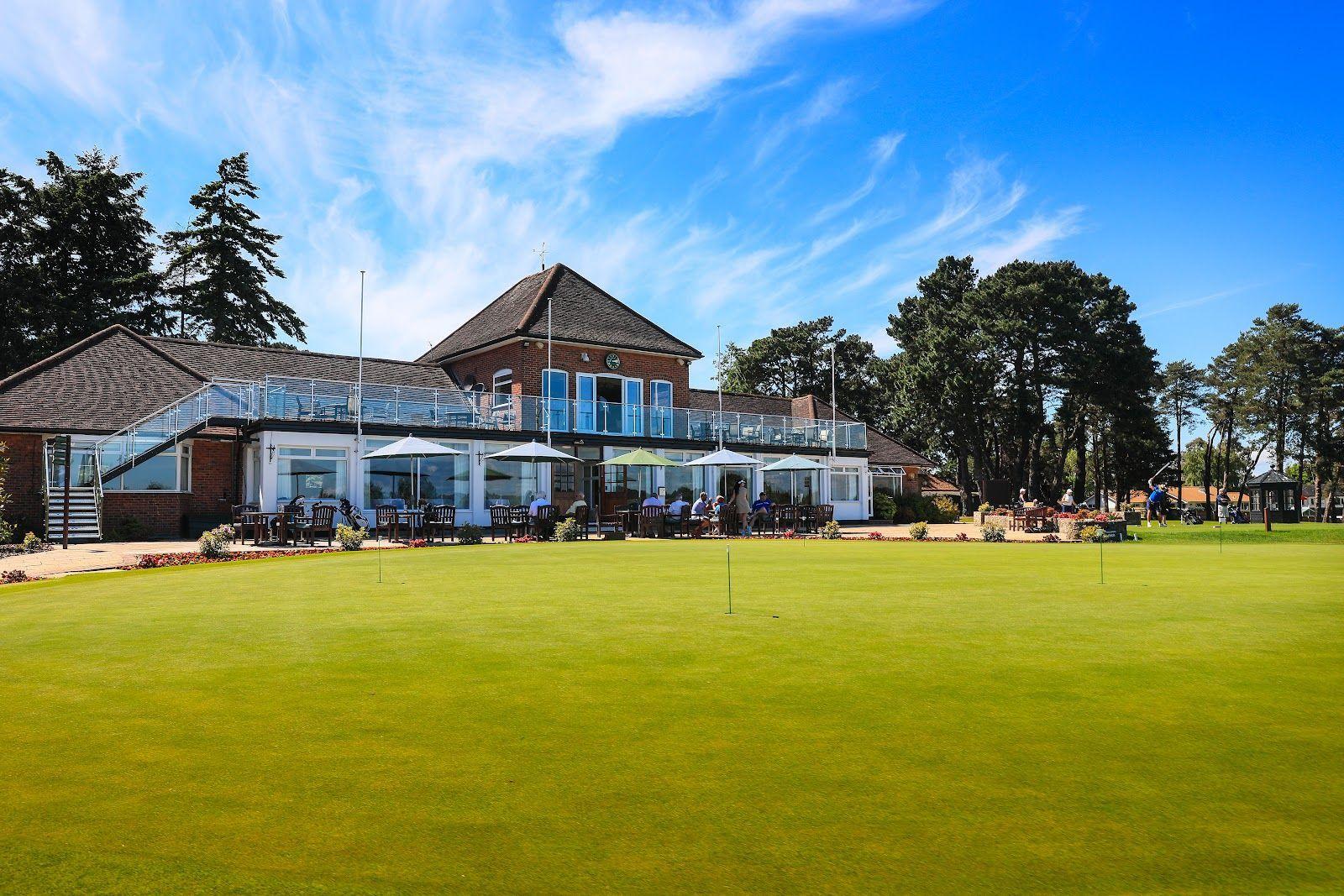 The Ferndown Golf Club with outdoor seating area looking over the course