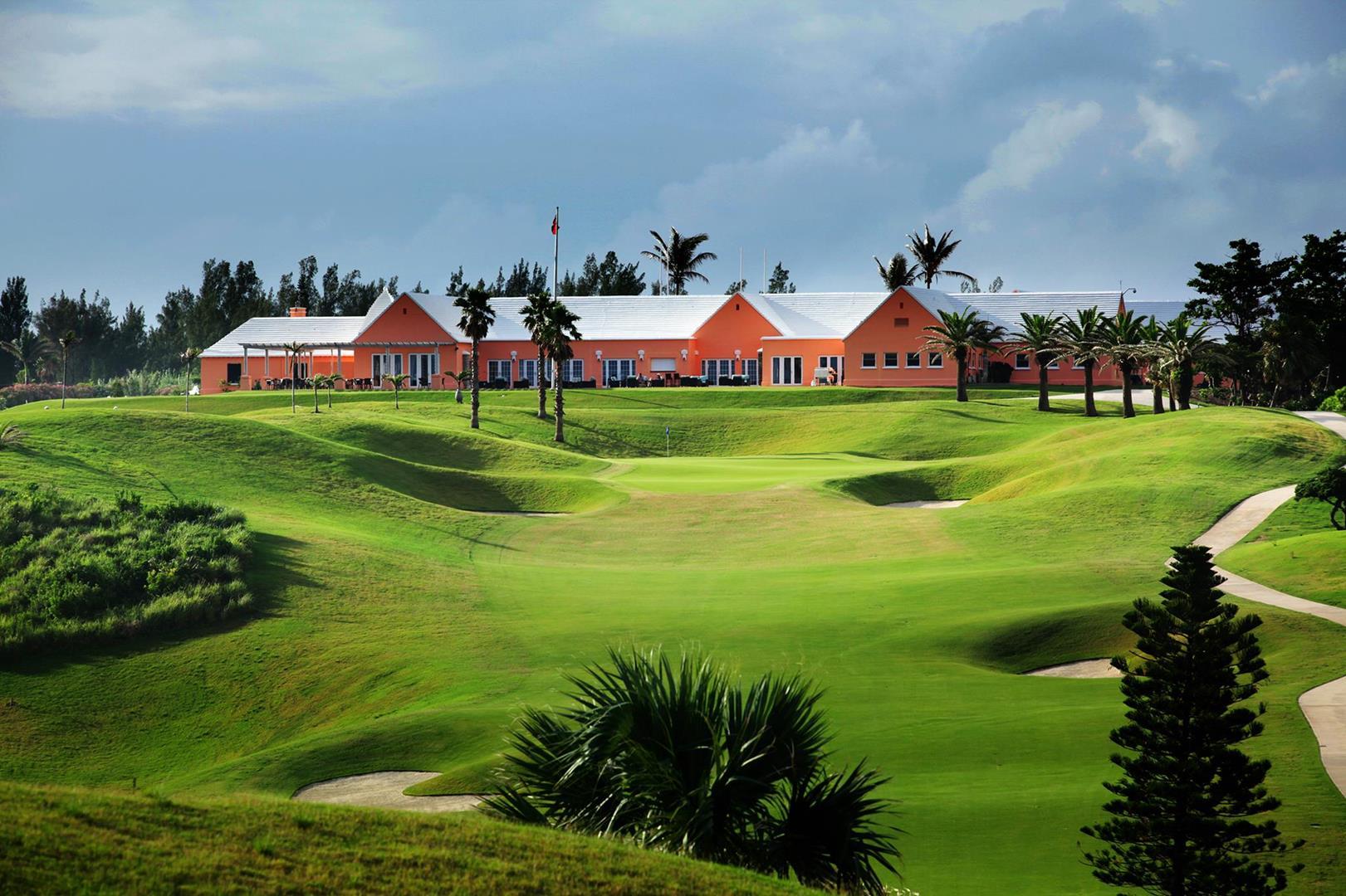 The Port Royal clubhouse overlooking a strategically placed green at the top of an uphill fairway