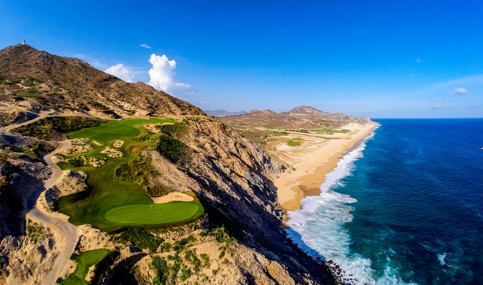 Aerial view of a green at the Quivira Golf Club look over the ocean