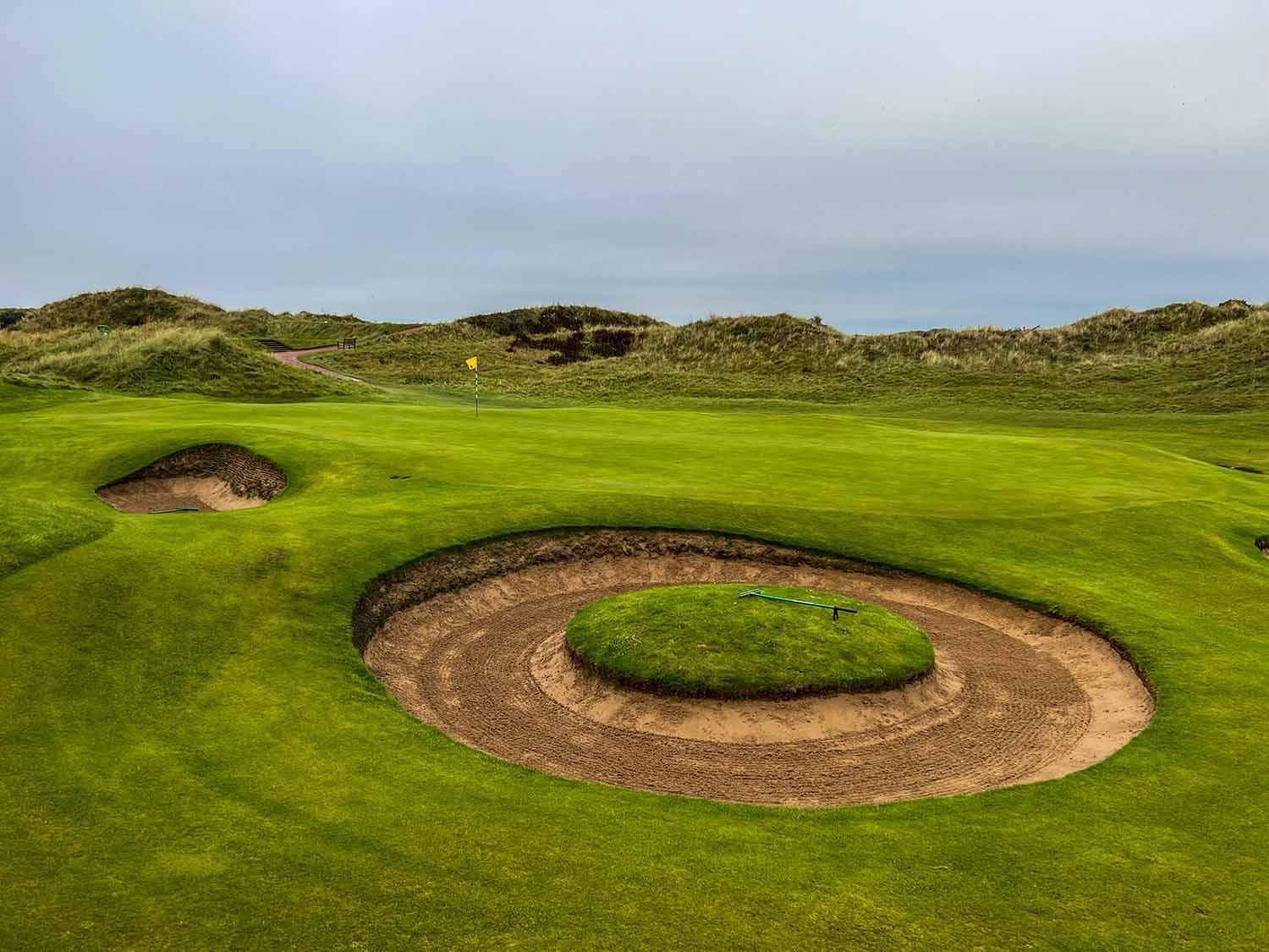 A unique circular bunker design adding character to the course.