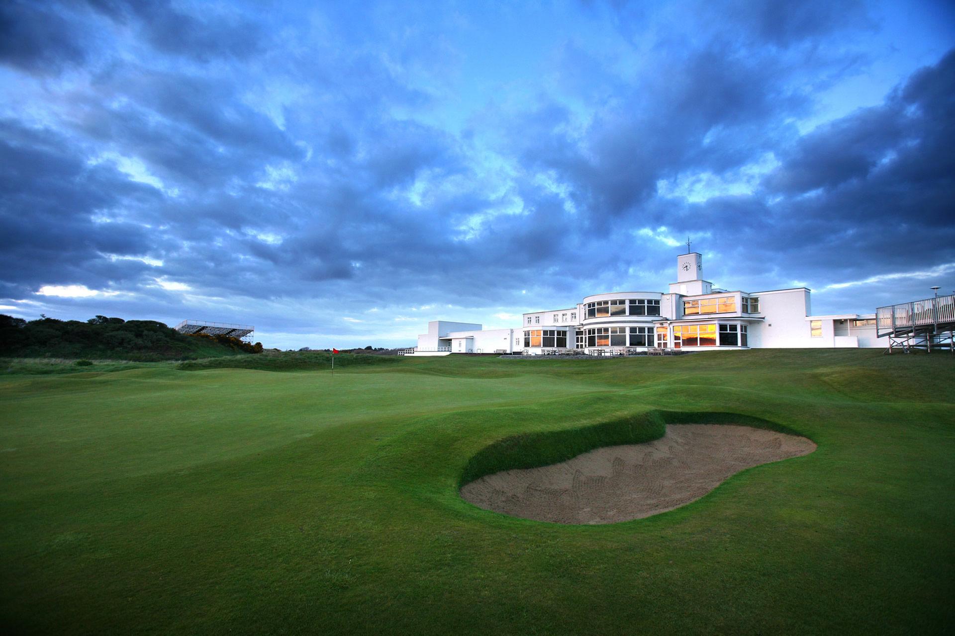 The iconic Royal Birkdale clubhouse standing tall beside the 18th green.